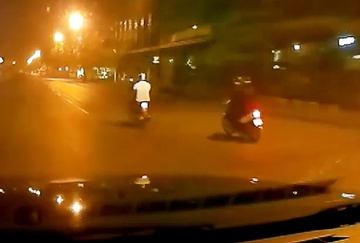 Cuoc ruot duoi hai thanh nien luc rang sang hinh anh