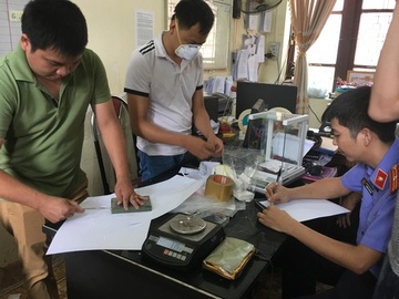 Bi bat cung 36 banh heroin, ga dan ong lao xe tu tu hinh anh