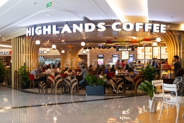 Jollibee muon ban co phan chuoi Highlands Coffee hinh anh
