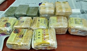 Giau 10 banh heroin, 9 kg ma tuy da duoi mai ngoi hinh anh