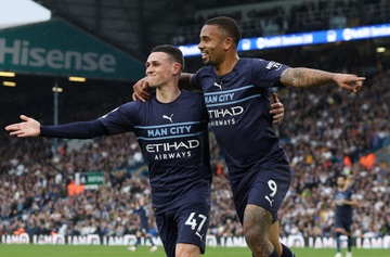 Man City doi lai ngoi dau Premier League sau chien thang 4-0 hinh anh