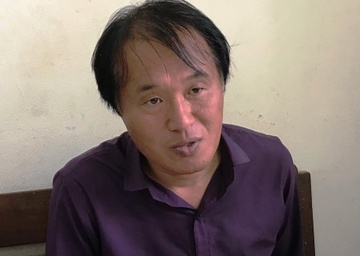 Nguoi dan ong Han Quoc ke dao vao co tai xe taxi, cuop tai san hinh anh
