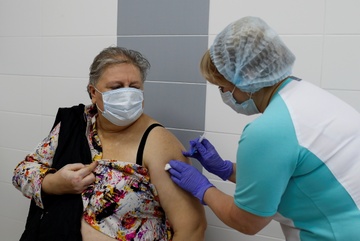 Ben trong noi tiem vaccine Covid-19 dai tra dau tien tren the gioi hinh anh