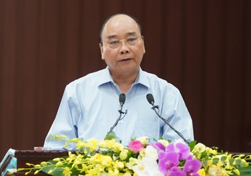 Thu tuong: Ha Noi can phan dau vuot muc thu nhap trung binh cao hinh anh