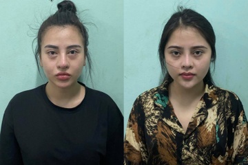 Khoi to hai co gai lien quan vu cuop tien hinh anh