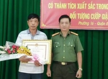 Nguoi bat cuop bi dam trung co duoc thuong 10 trieu dong hinh anh