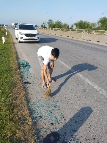nam tai xe don dep duong anh 1