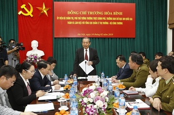 Pho thu tuong lam viec voi Tong cuc Quan ly Thi truong hinh anh