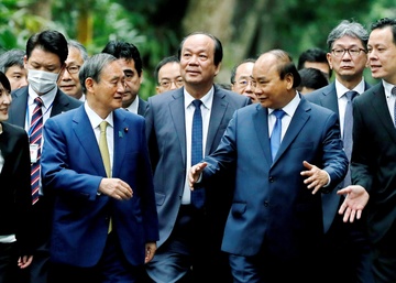 Ba diem nhan tu chuyen tham cua Thu tuong Suga hinh anh