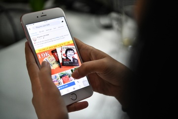 Nha xuat ban lap doi phan ung nhanh ngan chan sach lau tren Facebook hinh anh