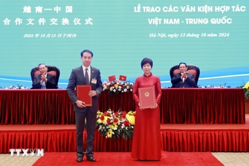 Thu tuong Viet Nam va Trung Quoc chung kien trao van kien hop tac hinh anh