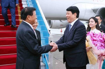 Tong Bi thu, Chu tich nuoc Lao chuc mung Chu tich nuoc Luong Cuong hinh anh