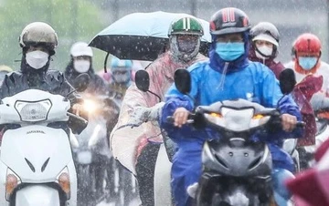 Mien Bac nang nong hai ngay roi lai chuyen mua dong hinh anh
