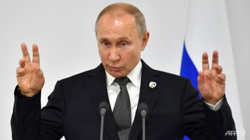Ong Putin tung tu choi su dung nguoi dong the hinh anh