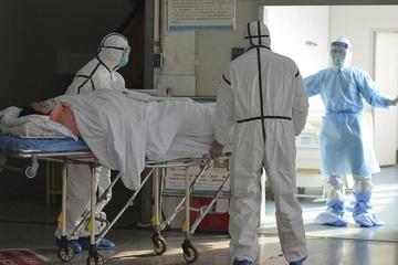 1/3 so ca nhiem virus corona tai Trung Quoc khong co trieu chung hinh anh