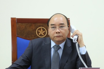 Thu tuong dien dam phoi hop chong dich voi thu tuong Lao, Campuchia hinh anh