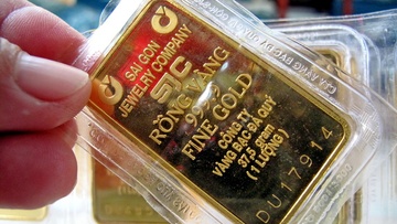 Truoc dem Noel, gia vang va USD cung di xuong hinh anh