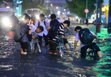 Anh huong ap thap nhiet doi, hoc sinh Sai Gon co the duoc nghi hinh anh
