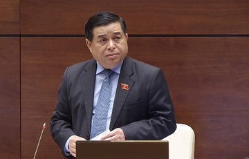 Bo truong Bo Ke hoach va Dau tu tra loi chat van Quoc hoi hinh anh