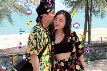 Vo Hoai Lam dang anh chong va nhan nhu loi ngot ngao hinh anh