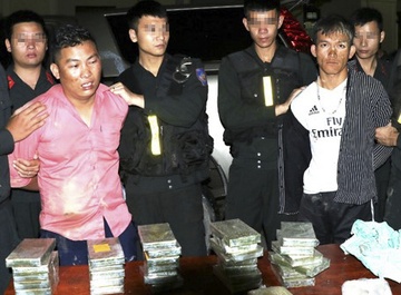 Van chuyen thue 30 banh heroin de lay 100 trieu dong hinh anh