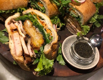 Co gi trong chiec banh mi gia 100 USD o TP.HCM hinh anh