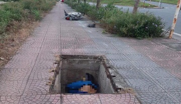 Nguoi dan ong tu vong duoi ho ga khong co nap hinh anh