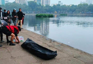 Vot duoc thi the nguoi dan ong duoi ho o Ha Noi hinh anh