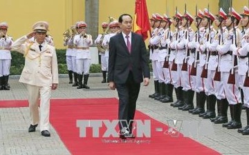 Chu tich nuoc du ky niem 65 nam luc luong Canh ve Cong an nhan dan hinh anh