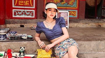 Sao Viet lang xe tro lai ao so mi tay phong ngay cuoi he hinh anh