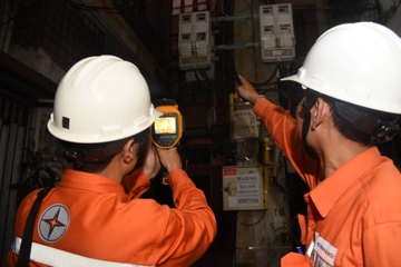 EVN Ha Noi canh bao hoa don tien dien sap tang vot hinh anh
