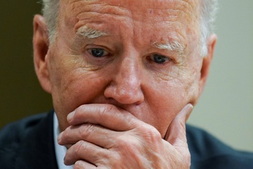 Ganh nang cua ong Biden giua 'mua dong bat man' hinh anh