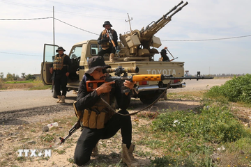 Quan doi Iraq trien khai xe boc thep toi khu vuc bien gioi voi Syria hinh anh