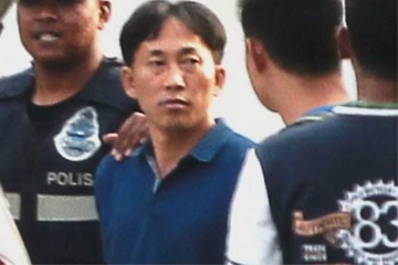 Giay phut canh sat truy bat nghi pham vu Kim Jong Nam hinh anh