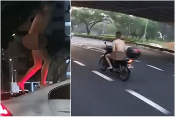 Singapore bat nguoi dan ong khoa than lai xe may hinh anh