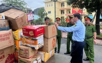 Cac ho tai La Phu tu nguyen giao nop 25 tan banh keo de tieu huy hinh anh