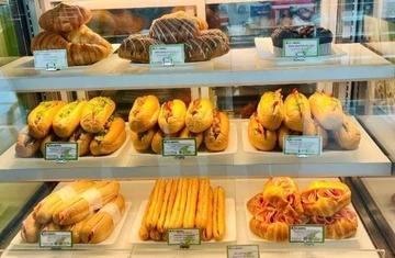 Tin moi vu banh my gia 208.000 dong o san bay Noi Bai hinh anh