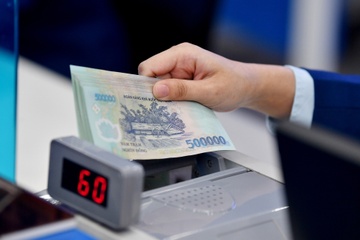 Nha dat va vang tang dung dung, gioi trung luu cam tien ty boi roi hinh anh