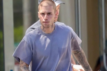 Justin Bieber buc boi vi bi phat hinh anh