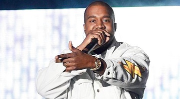 Kanye West bi tat mic vi lao len san khau hinh anh