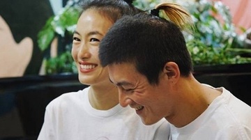 Tran Quan Hy hon ban gai nguoi mau Victoria's Secret noi cong cong hinh anh