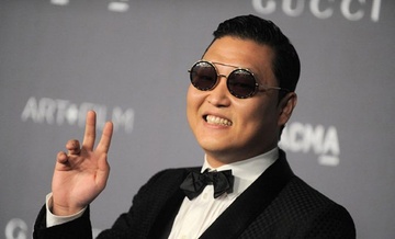 Psy danh mat dam me ca hat sau 'Gangnam Style' hinh anh