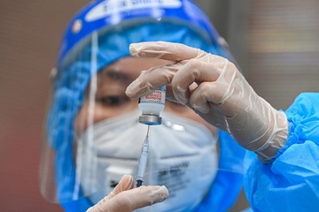 Cong suat tiem vaccine Covid-19 tai Ha Noi cao nhat tu truoc den nay hinh anh