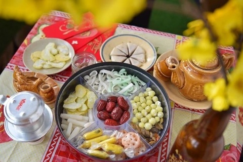 Tiep khach, tham nha, tang qua ngay Tet the nao cho tinh te? hinh anh