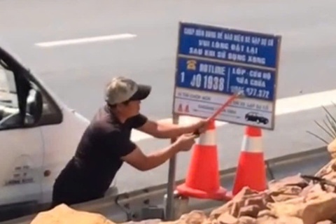 Nguoi dan ong pha hoai tai san tren cao toc Bac - Nam bi phat 1,5 trieu dong hinh anh