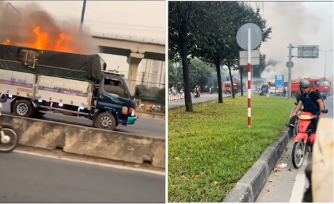 Xe tai chay ngun ngut di thang vao tru so PCCC o TP.HCM hinh anh