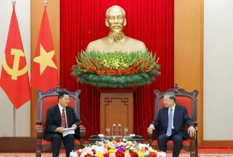 Tong Bi thu tiep Bo truong Cong an Lao hinh anh