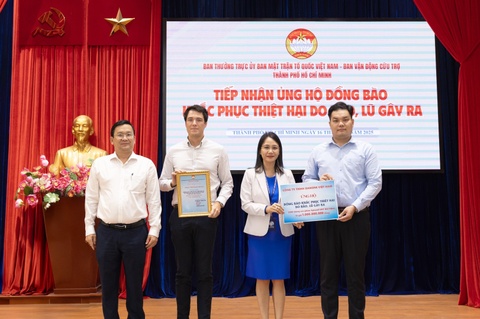 Danone Viet Nam tang 90.000 hop sua Aptamil KID UHT cho tre em vung lu hinh anh