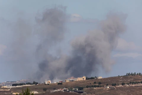 Israel va Hezbollah dat thoa thuan ngung ban hinh anh