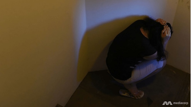 Phu nu Singapore nhan an tu anh 1